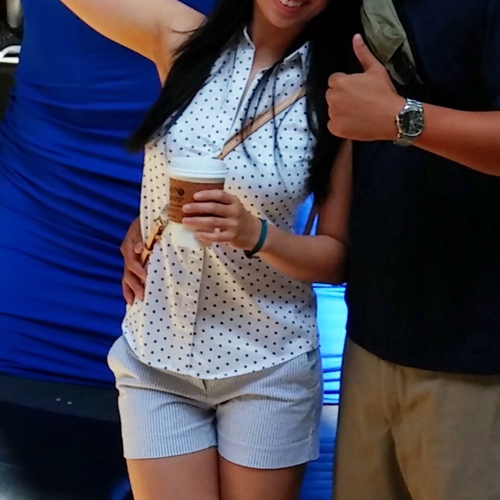 Polkadot sleeveless shirt and striped shorts combo